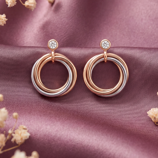 Entwine: Dual-Tone Interlocking Circle Drop Earrings in Sterling Silver